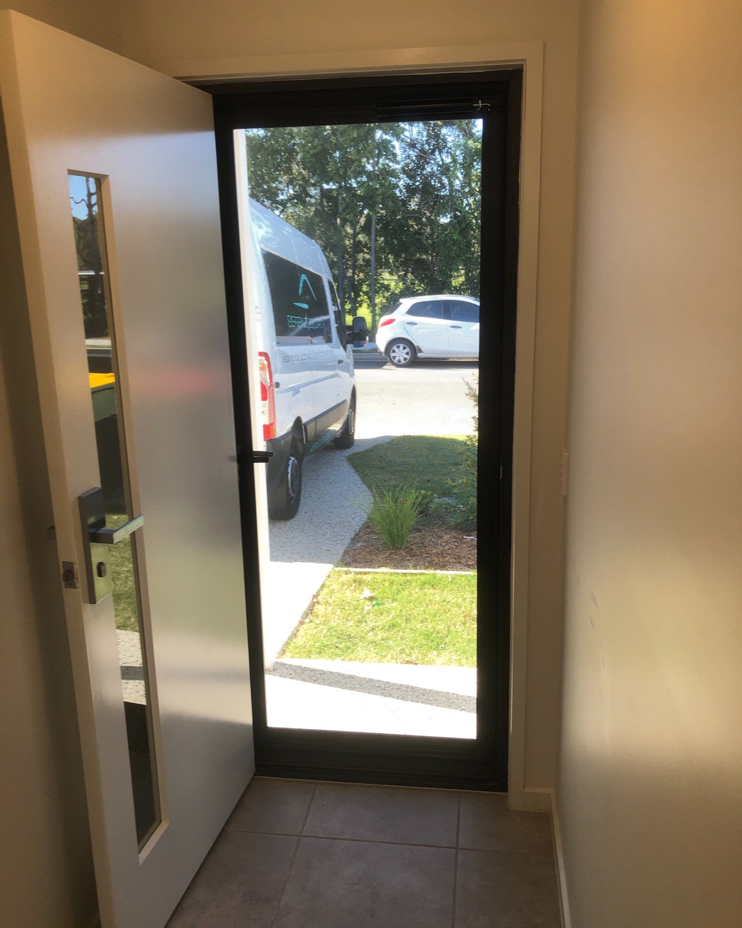 Security door with Serene Security van