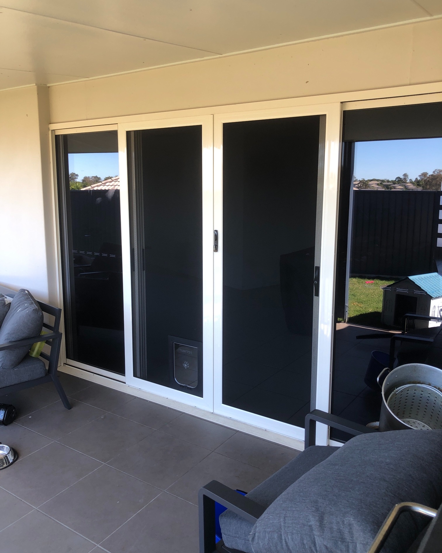Security screen door with pet door