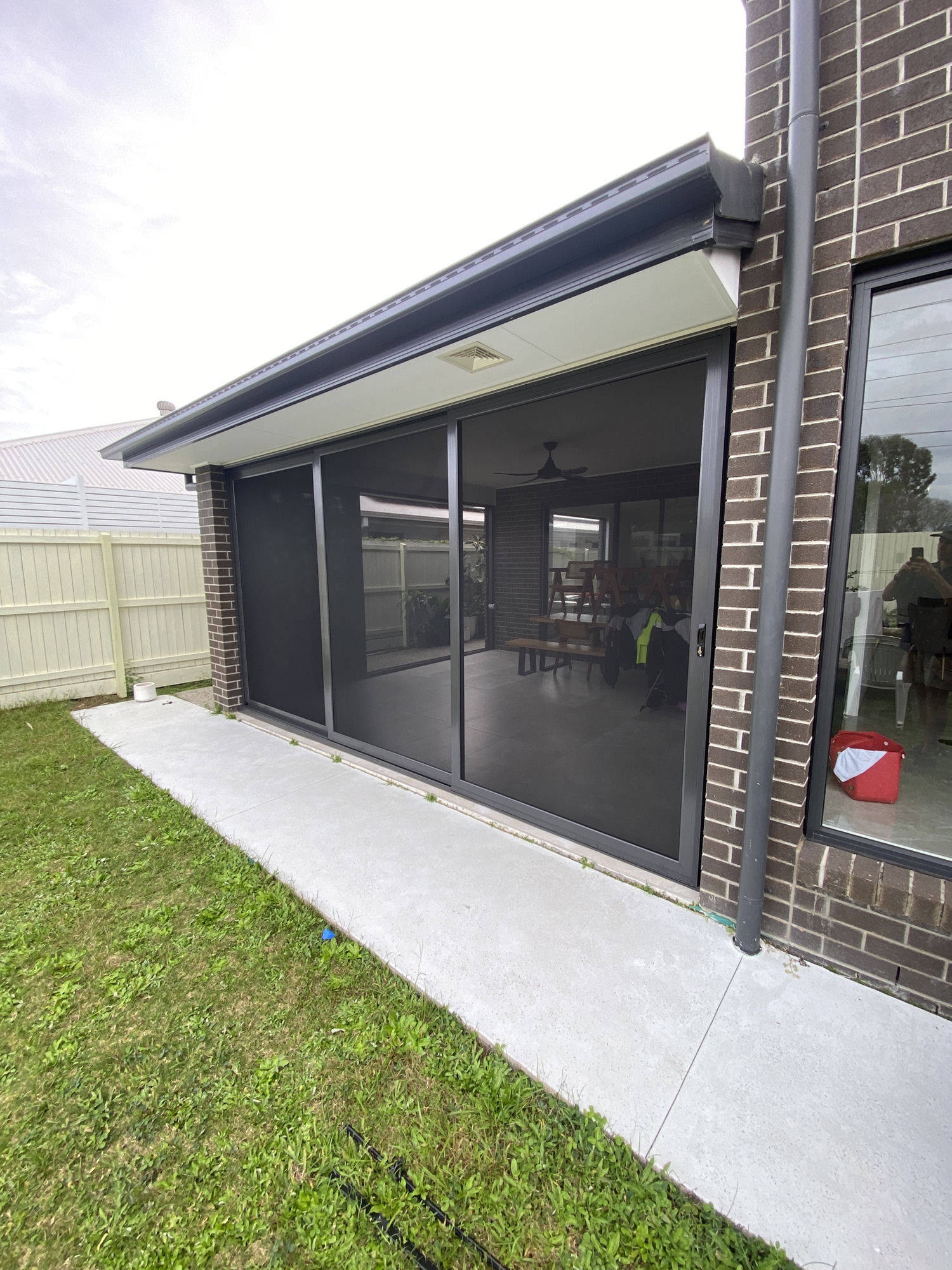 Sliding security screen patio enclosure